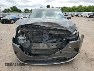2016 Mazda CX-9 Grand Touring with VIN JM3TCADY3G0125814, listed as a Copart auction lot 58299595 with 127,035 mi miles and Salvage title. Bid and sale history available at DreamBid. Image 5.