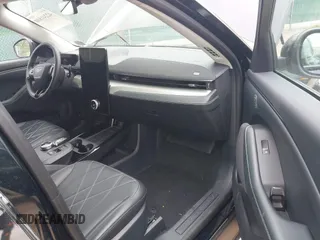 2021 Ford Mustang Mach-E Select with VIN 3FMTK1SS4MMA21329, listed as a IAAI auction lot 42241810 with 35,700 mi miles and . Bid and sale history available at DreamBid. Image 5.