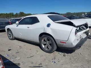 2016 Dodge Challenger SXT with VIN 2C3CDZAG1GH101561, listed as a IAAI auction lot 41684800 with 169,667 mi miles. Bid and sale history available at carsss.com. Image 3.