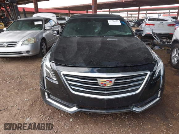 2017 Cadillac CT6 Luxury RWD z VIN 1G6KC5RXXHU127195, wystawiony jako IAAI lot #41782547 z przebiegiem 90 125 mil mil oraz . Historia ofert i sprzedaży dostępna na DreamBid. Obrazek 12.