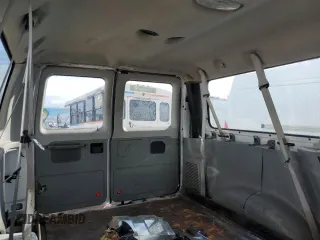 2011 Ford Econoline Passenger XL with VIN 1FBNE3BLXBDA75840, listed as a Copart auction lot 72030614 with 57,183 mi miles and Salvage Title. Bid and sale history available at DreamBid. Image 11.