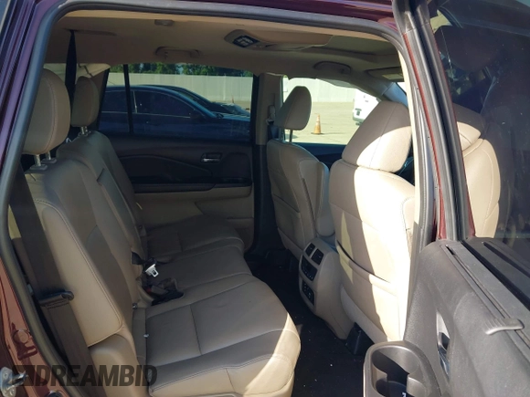 2017 Honda Pilot Touring with VIN 5FNYF5H96HB038413, listed as a IAAI auction lot 42594065 with 130,501 mi miles and . Bid and sale history available at DreamBid. Image 8.