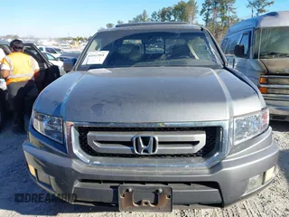 2010 Honda Ridgeline RTL with VIN 5FPYK1F52AB004678, listed as a IAAI auction lot 41661968 with 169,021 mi miles. Bid and sale history available at carsss.com. Image 12.