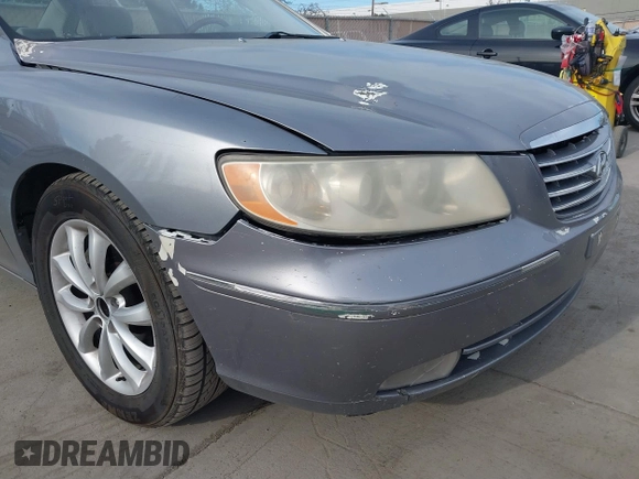 2006 Hyundai Azera SE with VIN KMHFC46F06A121940, listed as a IAAI auction lot 41707660 with 209,461 mi miles and . Bid and sale history available at DreamBid. Image 6.