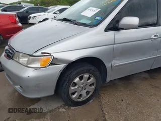 2004 Honda Odyssey EX with VIN 5FNRL18694B076305, listed as a IAAI auction lot 41929212 with 287,717 mi miles and . Bid and sale history available at DreamBid. Image 14.
