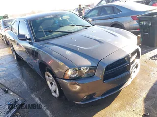 2014 Dodge Charger RT z VIN 2C3CDXCT9EH368829, wystawiony jako IAAI lot #41614910 z przebiegiem 120 748 mil mil oraz . Historia ofert i sprzedaży dostępna na DreamBid. Obrazek 1.
