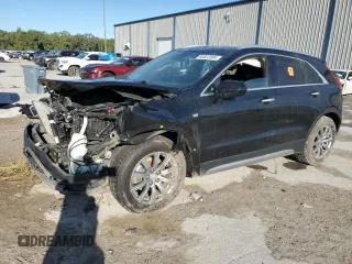 2020 Cadillac XT4 FWD Premium Luxury with VIN 1GYFZCR4XLF070463, listed as a Copart auction lot 47870865 with 88,406 mi miles and Non Repairable. Bid and sale history available at carsss.com. Image 1.