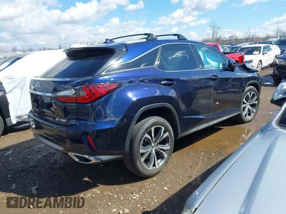 2016 Lexus RX 350 with VIN 2T2BZMCA2GC004895, listed as a IAAI auction lot 41859749 with 104,370 mi miles and . Bid and sale history available at DreamBid. Image 4.