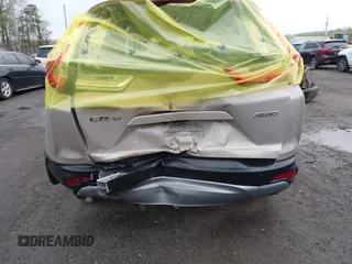 2018 Honda CR-V EX-L with VIN 5J6RW2H81JL025818, listed as a IAAI auction lot 42038457 with 102,579 mi miles. Bid and sale history available at carsss.com. Image 6.