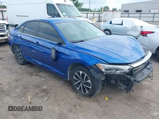 2023 Volkswagen Jetta S z VIN 3VW4M7BU0PM010739, wystawiony jako IAAI lot #42400838 z przebiegiem 51 666 mil mil oraz . Historia ofert i sprzedaży dostępna na DreamBid. Obrazek 1.