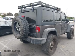 2016 Jeep Wrangler Unlimited Sport с VIN 1C4BJWDG7GL215562, выставлен на аукционе IAAI как лот 42425994 с пробегом 81 895 миль миль и . История ставок и продаж доступна на DreamBid. Изображение 4.