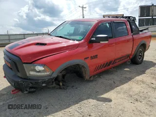 2016 Ram 1500 Rebel z VIN 1C6RR7YT8GS251598, wystawiony jako Copart lot #55291555 z przebiegiem 128 756 mil mil oraz Szkoda całkowita • Salvage title. Historia ofert i sprzedaży dostępna na DreamBid. Obrazek 1.
