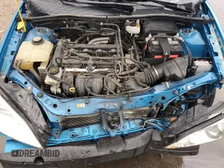 2007 Ford Focus S z VIN 1FAFP34N47W164846, wystawiony jako Copart lot #55587185 z przebiegiem 41 172 mil mil oraz Szkoda całkowita • Salvage title. Historia ofert i sprzedaży dostępna na DreamBid. Obrazek 11.