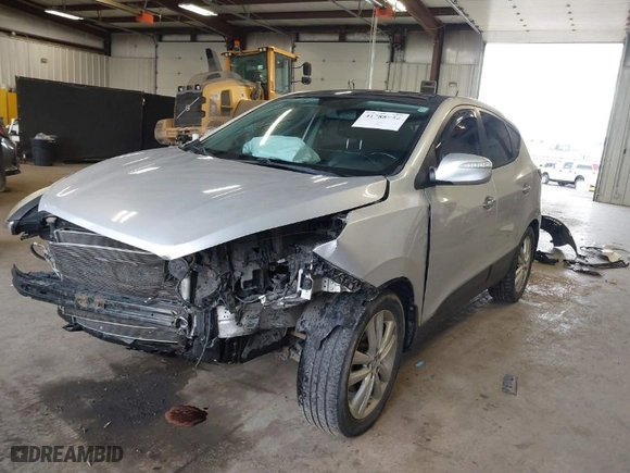2011 Hyundai Tucson Limited with VIN KM8JUCAC2BU156616, listed as a IAAI auction lot 41788854 with 193,978 mi miles. Bid and sale history available at carsss.com. Image 2.