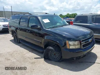 2007 Chevrolet Suburban LT with VIN 3GNFC16057G132960, listed as a IAAI auction lot 42565959 with 144,332 mi miles and . Bid and sale history available at DreamBid. Image 1.