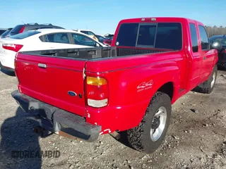 1999 Ford Ranger XL with VIN 1FTZR15V2XTA07631, listed as a IAAI auction lot 41591752 with 179,967 mi miles. Bid and sale history available at carsss.com. Image 4.