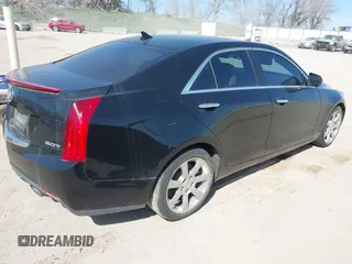 2013 Cadillac ATS z VIN 1G6AA5RX3D0175365, wystawiony jako IAAI lot #42024806 z przebiegiem 107 133 mil mil oraz . Historia ofert i sprzedaży dostępna na DreamBid. Obrazek 4.