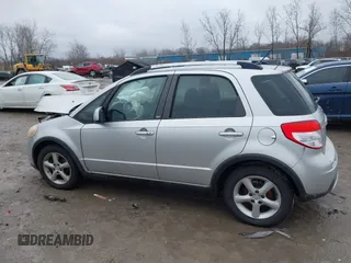2007 Suzuki SX4 Man Touring Pkg AWD with VIN JS2YB417475102405, listed as a IAAI auction lot 41106931 with 170,315 mi miles. Bid and sale history available at carsss.com. Image 14.
