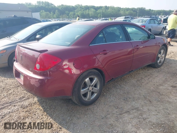2005 Pontiac G6 GT with VIN 1G2ZH528454148009, listed as a IAAI auction lot 42415436 with 195,408 mi miles and . Bid and sale history available at DreamBid. Image 4.