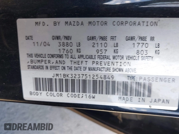 2005 Mazda 3 s with VIN JM1BK323751254849, listed as a IAAI auction lot 41645553 with 241,527 mi miles. Bid and sale history available at carsss.com. Image 9.