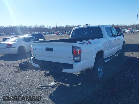 2021 Toyota Tacoma 4WD SR5 with VIN 3TYDZ5BN4MT000619, listed as a IAAI auction lot 41886686 with 91,338 mi miles. Bid and sale history available at carsss.com. Image 4.