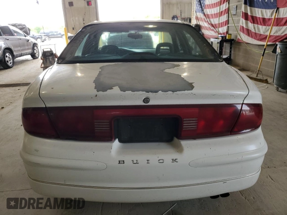 1998 Buick Regal LS with VIN 2G4WB52K5W1415761, listed as a Copart auction lot 55811595 with 102,133 mi miles and Salvage title. Bid and sale history available at DreamBid. Image 6.