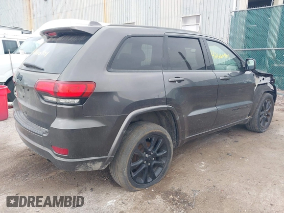 2018 Jeep Grand Cherokee Altitude z VIN 1C4RJFAGXJC190814, wystawiony jako IAAI lot #42660901 z przebiegiem 127 632 mil mil oraz . Historia ofert i sprzedaży dostępna na DreamBid. Obrazek 4.