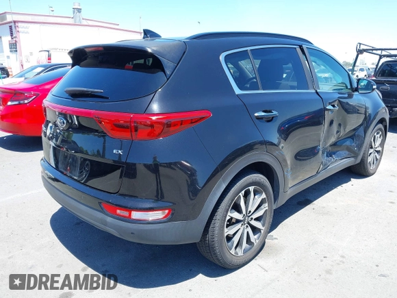 2019 Kia Sportage EX with VIN KNDPN3AC2K7602435, listed as a IAAI auction lot 42233427 with 58,730 mi miles and . Bid and sale history available at DreamBid. Image 4.
