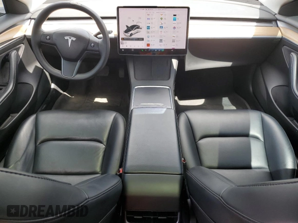 2021 Tesla Model 3 Standard Range Plus with VIN 5YJ3E1EA2MF985463, listed as a Copart auction lot 53311455 with 23,176 mi miles and Clean Title. Bid and sale history available at DreamBid. Image 8.