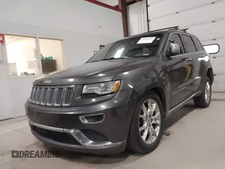 2015 Jeep Grand Cherokee Summit with VIN 1C4RJFJT6FC754799, listed as a IAAI auction lot 41699124 with 124,206 mi miles and . Bid and sale history available at DreamBid. Image 6.
