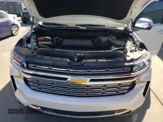 2023 Chevrolet Tahoe Premier with VIN 1GNSCSKD6PR119132, listed as a Copart auction lot 74594664 with 27,716 mi miles and Salvage title. Bid and sale history available at DreamBid. Image 12.