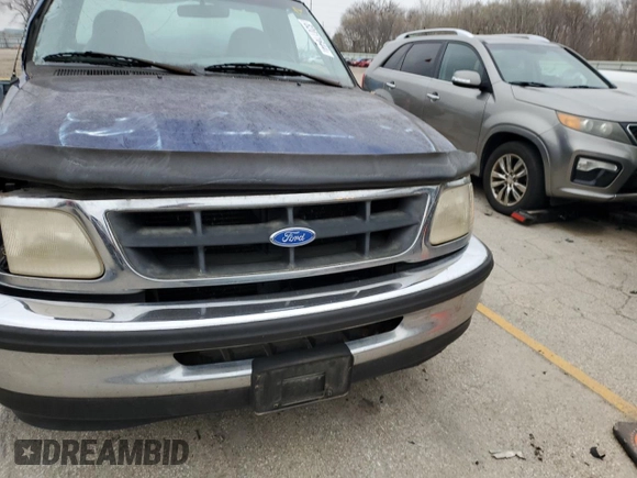 1997 Ford F-150 with VIN 1FTDF1724VKC02428, listed as a Copart auction lot 82011644 with 111,520 mi miles and Salvage title. Bid and sale history available at DreamBid. Image 5.