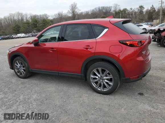 2021 Mazda CX-5 Grand Touring Reserve with VIN JM3KFBAY3M0315640, listed as a Copart auction lot 51004955 with 21,981 mi miles and Salvage Title. Bid and sale history available at DreamBid. Image 2.