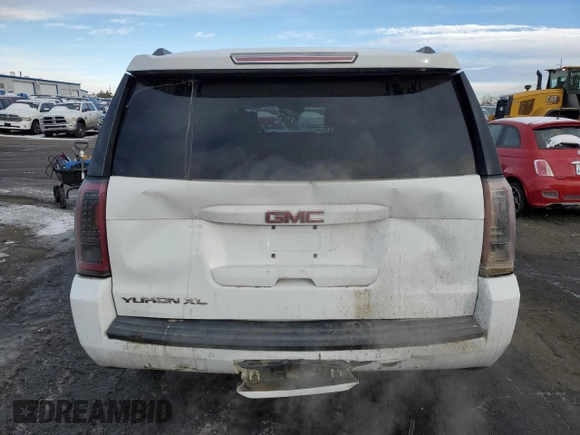 2015 GMC Yukon XL SLT with VIN 1GKS2HKC0FR220823, listed as a Copart auction lot 42155185 with 199,385 mi miles and Salvage Title. Bid and sale history available at carsss.com. Image 6.