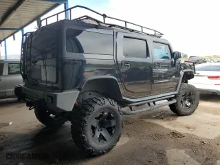 2006 Hummer H2 with VIN 5GRGN23U16H105309, listed as a Copart auction lot 67101374 with 86,809 mi miles and Salvage Title. Bid and sale history available at carsss.com. Image 3.