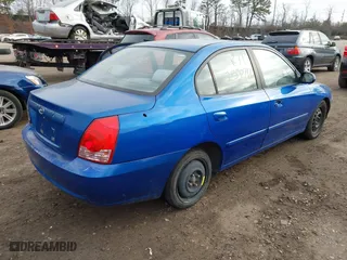 2006 Hyundai Elantra GLS with VIN KMHDN46D36U376628, listed as a IAAI auction lot 41809507 with 999,999 mi miles. Bid and sale history available at carsss.com. Image 4.