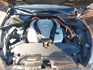 2014 Infiniti Q50 Hybrid Sport with VIN JN1AV7AP3EM691473, listed as a IAAI auction lot 41348911 with 128,851 mi miles and . Bid and sale history available at DreamBid. Image 10.