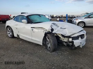 2010 BMW Z4 sDrive30i with VIN WBALM5C56AE377066, listed as a Copart auction lot 42872935 with 126,264 mi miles and Salvage Title. Bid and sale history available at carsss.com. Image 4.