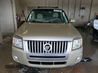2010 Mercury Mariner Premier z VIN 4M2CN8H75AKJ06362, wystawiony jako Copart lot #56414635 z przebiegiem 193 089 mil mil oraz Szkody całkowita. Historia ofert i sprzedaży dostępna na DreamBid. Obrazek 5.