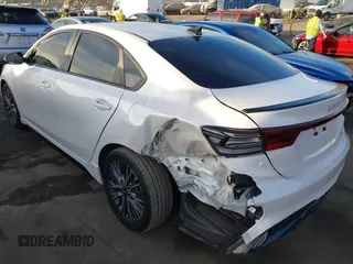 2023 Kia Forte GT-Line z VIN 3KPF54AD0PE673666, wystawiony jako IAAI lot #41242873 z przebiegiem 24 075 mil mil oraz . Historia ofert i sprzedaży dostępna na DreamBid. Obrazek 3.