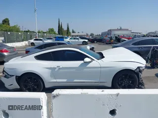2015 Ford Mustang EcoBoost with VIN 1FA6P8TH4F5332918, listed as a IAAI auction lot 42357674 with 88,595 mi miles and . Bid and sale history available at DreamBid. Image 14.