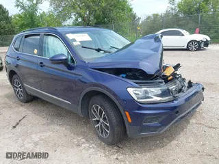 2021 Volkswagen Tiguan SE with VIN 3VV2B7AXXMM084355, listed as a IAAI auction lot 39559023 with 1 mi miles. Bid and sale history available at carsss.com. Image 1.