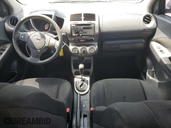 2012 Scion xD with VIN JTKKU4B46C1023892, listed as a Copart auction lot 65459665 with 212,452 mi miles and Salvage title. Bid and sale history available at DreamBid. Image 8.