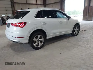 2020 Audi Q3 Premium with VIN WA1AECF3XL1090825, listed as a IAAI auction lot 42541577 with 32,432 mi miles and . Bid and sale history available at DreamBid. Image 4.