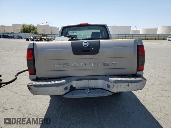 2004 Nissan Frontier XE with VIN 1N6DD26TX4C447116, listed as a Copart auction lot 59432335 with 127,001 mi miles and Salvage title. Bid and sale history available at DreamBid. Image 6.