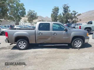 2012 GMC Sierra 1500 SLE z VIN 3GTP1VE01CG217140, wystawiony jako IAAI lot #42503838 z przebiegiem 237 912 mil mil oraz . Historia ofert i sprzedaży dostępna na DreamBid. Obrazek 13.