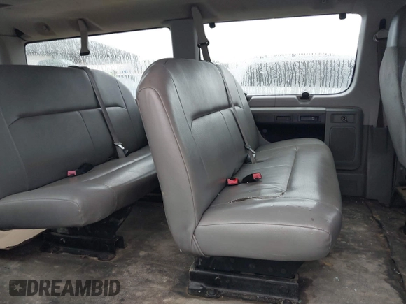 2010 Ford Econoline Passenger XL with VIN 1FMNE1BW5ADA57279, listed as a IAAI auction lot 41036937 with 259,841 mi miles and . Bid and sale history available at DreamBid. Image 8.