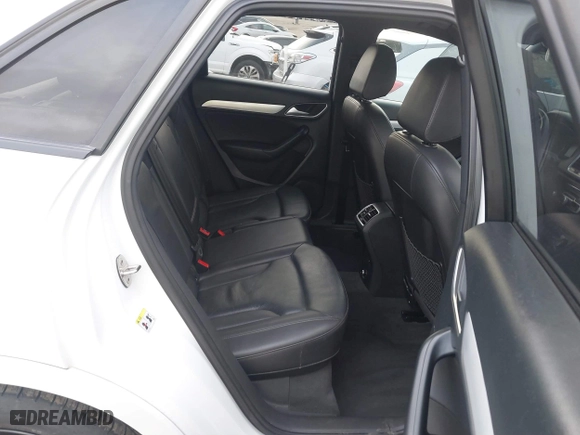 2018 Audi Q3 Premium with VIN WA1BCCFSXJR028356, listed as a IAAI auction lot 41761544 with 82,877 mi miles. Bid and sale history available at carsss.com. Image 8.