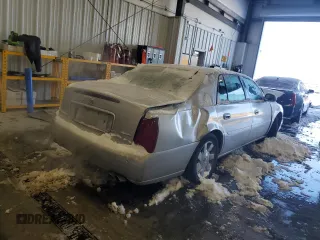 2002 Cadillac DeVille DTS with VIN 1G6KF57912U199809, listed as a Copart auction lot 87372504 with 154,663 mi miles and Salvage Title. Bid and sale history available at carsss.com. Image 3.