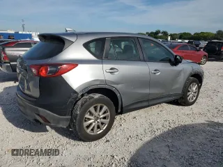 2015 Mazda CX-5 Sport with VIN JM3KE2BE2F0445810, listed as a Copart auction lot 65672555 with 218,675 mi miles and Clean title. Bid and sale history available at DreamBid. Image 3.